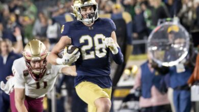 Notre Dame Fighting Irish safety Luke Talich (28) runs the ball for a touchdown